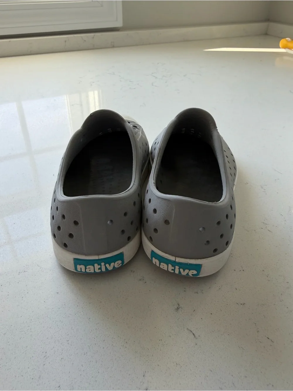 Native Slip-On Shoes in Gray with White Toe Caps